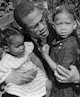 Malcolm X with his daughters